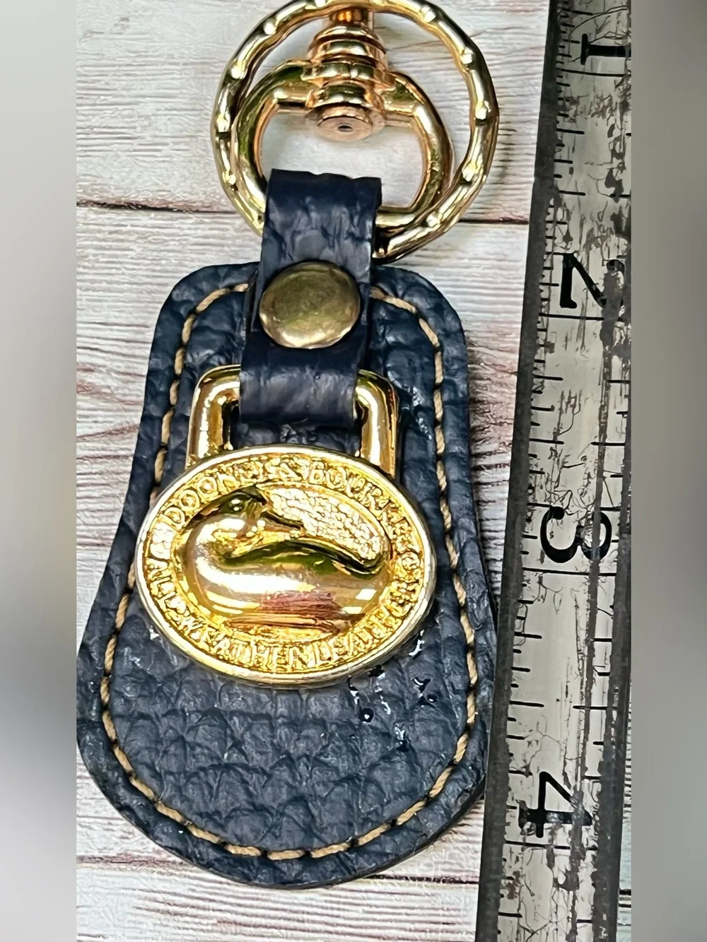 Dooney and Bourke Navy Leather Key Fob with Brass Accent